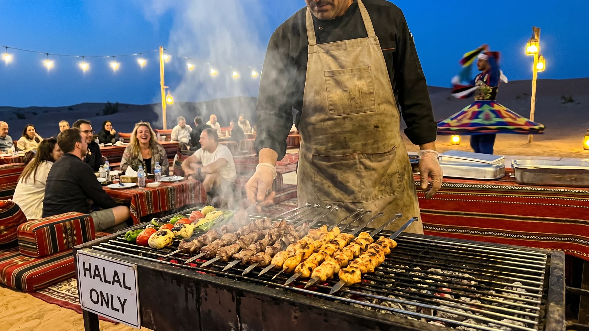 Evening desert safari with halal BBQ dinner at a Dubai desert camp
