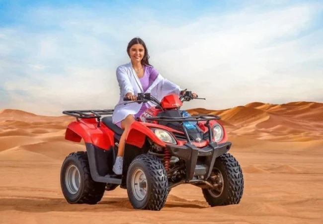 Yamaha 400cc ATV on a dune ridge during a guided tour near Dubai