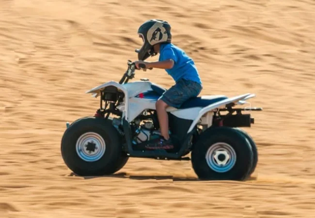 Yamaha 90cc kids ATV on the supervised track in the Dubai desert
